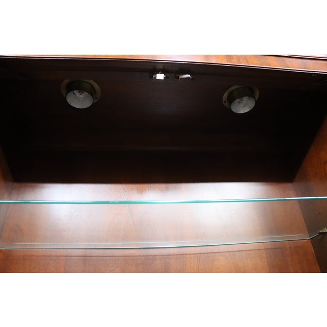 Baker Historic Charleston Collection Mahogany, lighted, glass shelves, ample storage, silver drawer