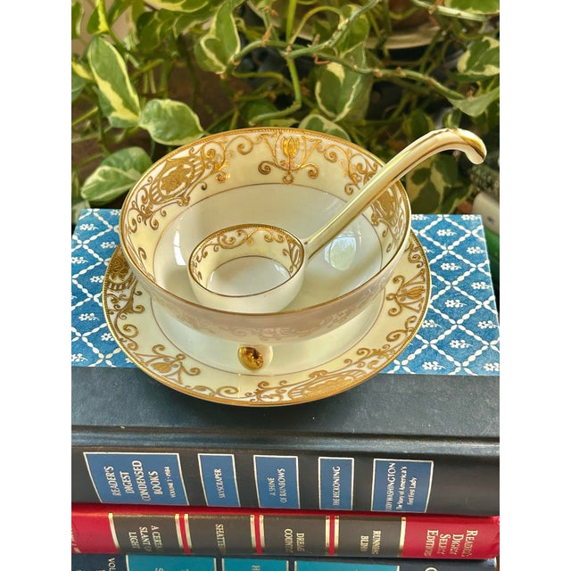 A charming antique Noritake condiment service in the No. 175 “Christmas Ball” pattern, featuring a footed bowl with...
