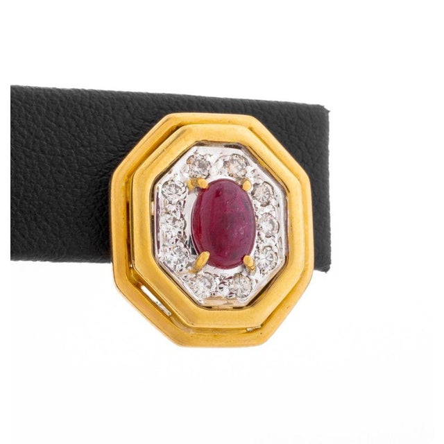 Pair of 18K Yellow Gold Ruby Diamond Earrings, featuring two cabochon oval rubies weighing a total of approx. 2.10 carats,...