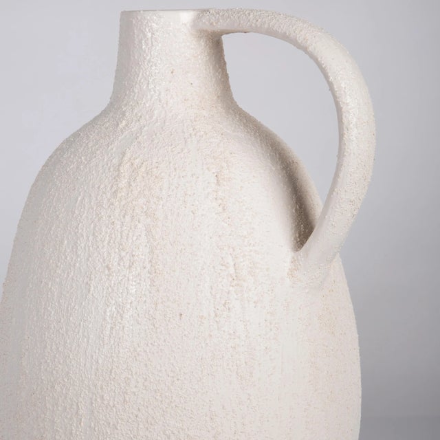 Country style goes modern and classy with this decorative jar, an ideal choice for any room. White finish ceramic is...