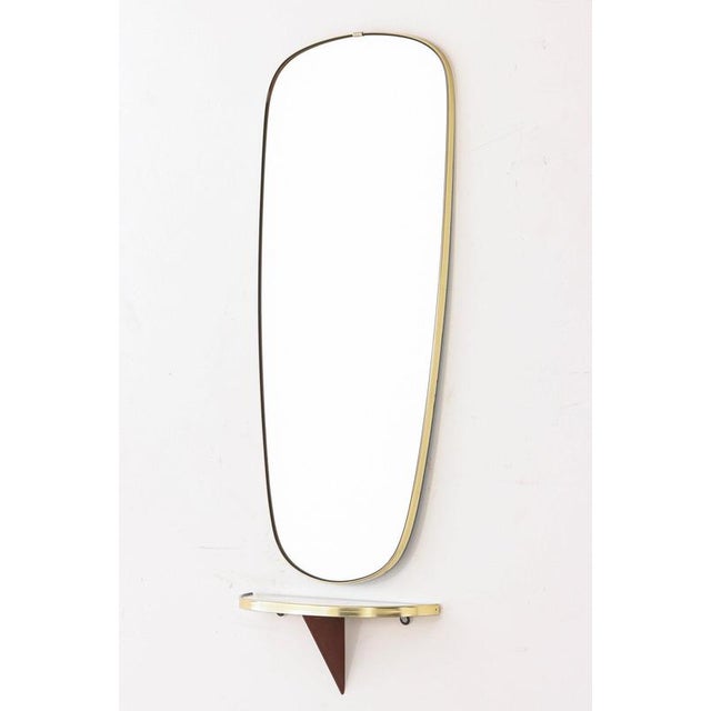 For sale is an elegant mid-century wall mirror with a matching console table by Johansen Copenhagen from the 1960s. The...