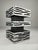 This striking, brutalist-style aluminum candlestick captures the raw, sculptural spirit of 1960s and 70s design. Its...