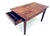 Vintage 1950s Coffee Table. The coffee table is Italian-made from the 1950s, entirely made of cherry wood, restored and...