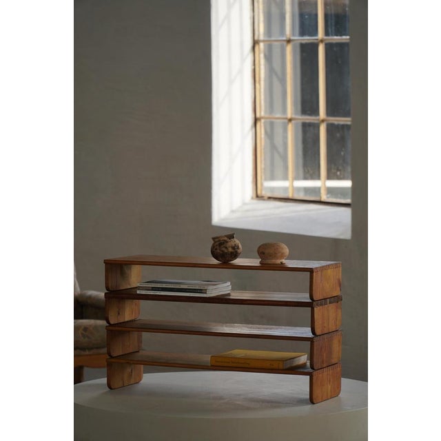 A rare set of Swedish pine wall shelves originating from the Royal Library building in Humlegården, Stockholm. The...