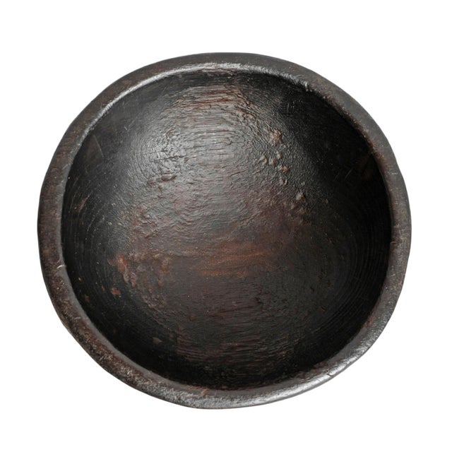 Vintage Baule hand carved wood bowl with rich dark finish. Beautiful signs of age and use add unique character and...