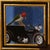 Night Rider by Shawn Sullivan | Oil on panel Bird perched on a motorcycle in a framed setting. For Sale