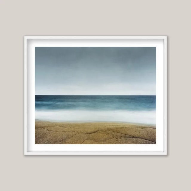 An early-morning photograph of Coumeenoole Strand, the remarkable beach on Ireland’s Dingle Peninsula. Made with a long...