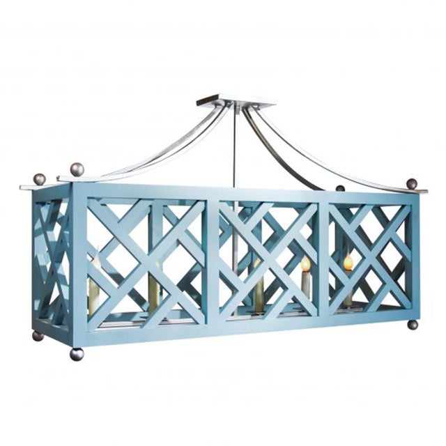 The custom wood and steel mixed material Elongated Chippendale Chandelier lends itself to all types of creative ideas. A...