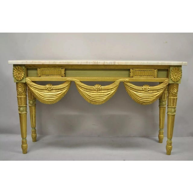 Italian Regency Neoclassical Green Gold Marble French Louis XVI Console Table. Item features carved wood "drape" skirt,...