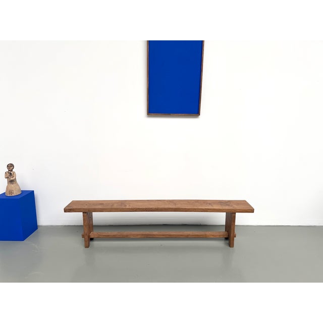 Maison Lecan presents this 1950s solid oak farmhouse bench, a piece of remarkable formal purity that perfectly illustrates...