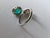A very gorgeous and beautiful, Emerald Engagement Ring set in 18K White Gold & natural Diamonds. The weight of the Emerald...