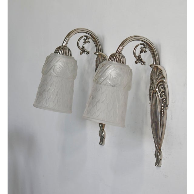 Léon Hugue & Charles Schneider A pair of French 1925-1935 art deco wall sconces made by the Paris based company of Léon...