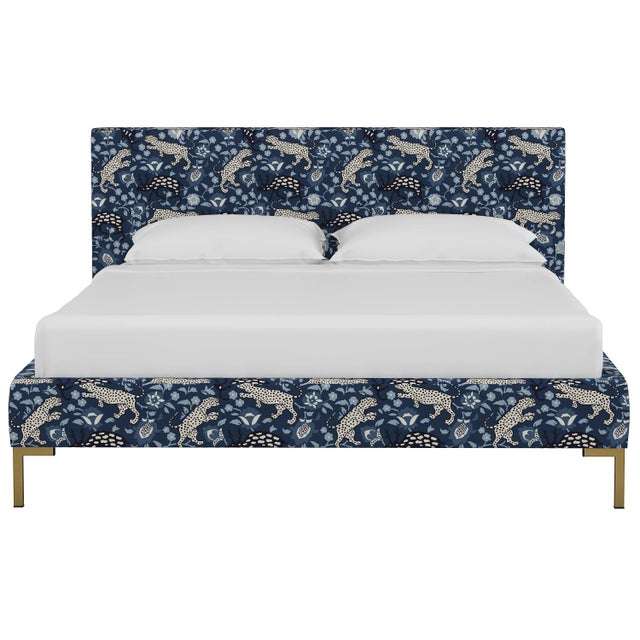 This low profile fully upholstered platform bed is a perfect piece for anyone looking to add a modern statement piece to...