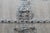 A dramatic antique compound door from Shanxi province, China, crafted from solid pine and reinforced with extensive hand-...