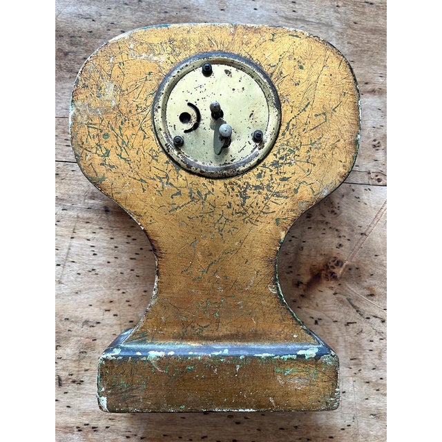 This petite clock is perfect for a bookcase, side table, or desk. It is painted a vibrant green, with beautiful gold...