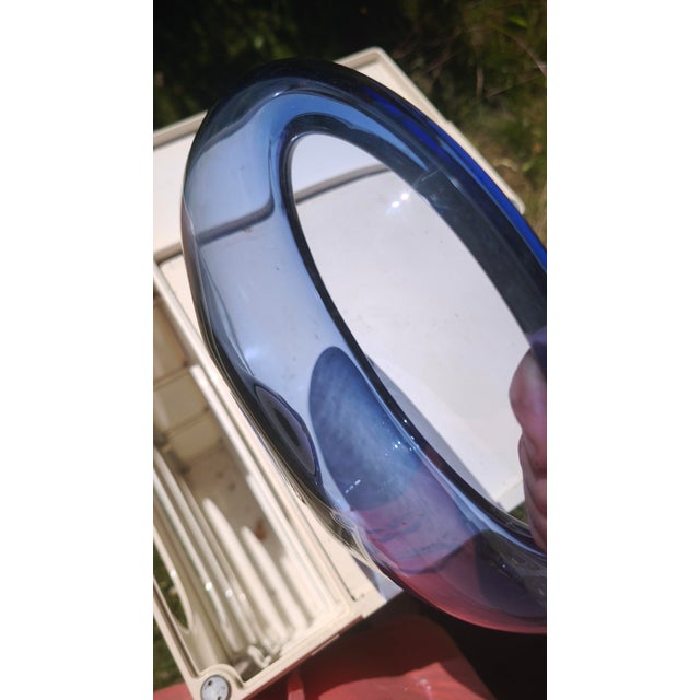 The bowl is engraved on the bottom with the identification mark and model number. This piece has an attribution mark, I am...