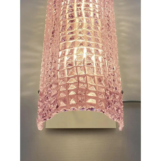 Set of two Organic style wall sconces in Murano glass. Scenographic pink color for italian luxury sconces. Luxury and...
