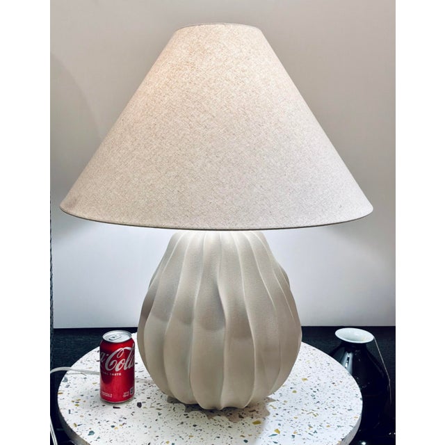 Stylish Organic Modern Matte White Wavy Porcelain Javary Table Lamp, light beige shade, showroom floor sample