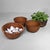 Decorative set of three vintage Japanese bamboo baskets, dating from around the 1960s. The baskets have a low rounded bowl...
