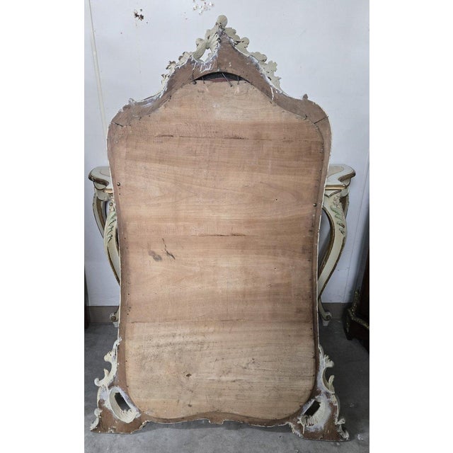 Louis xv style console and large mirror in lacquered and gilt wood a louis xv style console and mirror set, featuring...