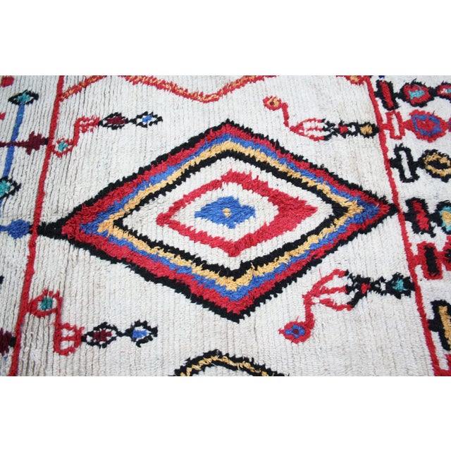 One-of-a-kind hand-knotted rug in the High Atlas Mountains of Morocco with soft organic wool. Featuring an intricate...