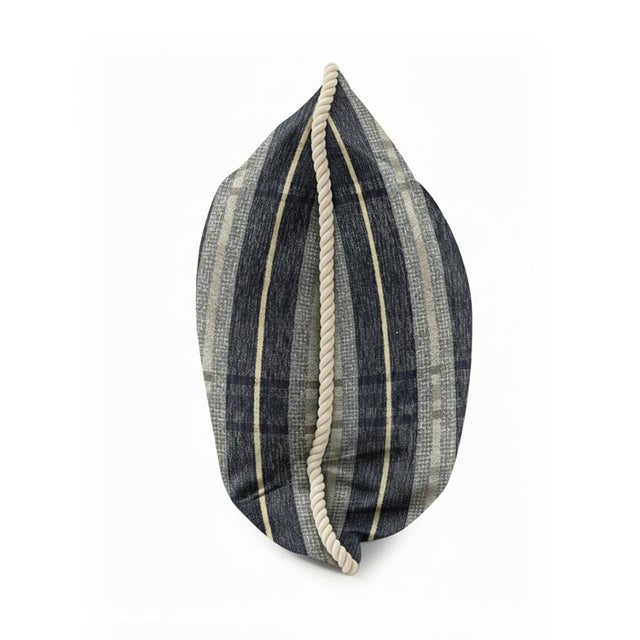 This woven fabric features a timeless plaid pattern in soft, neutral tones that blend modern sophistication with classic...