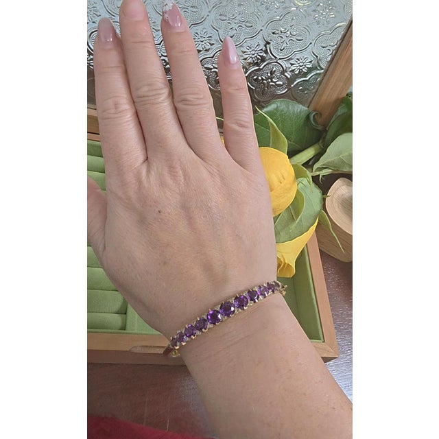 We offer free 2-day shipping! Vintage 14K Gold Amethyst & Diamond Filigree Bangle Circa 1950 An elegant mid-century bangle...