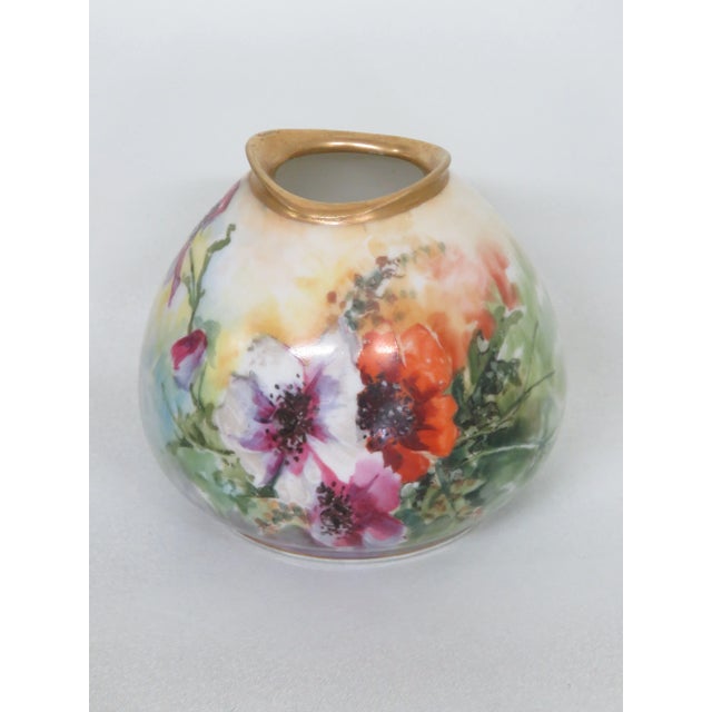 This highly charming small Vase is made out of porcelain, and is in good condition. This beautiful vase has magnificent...