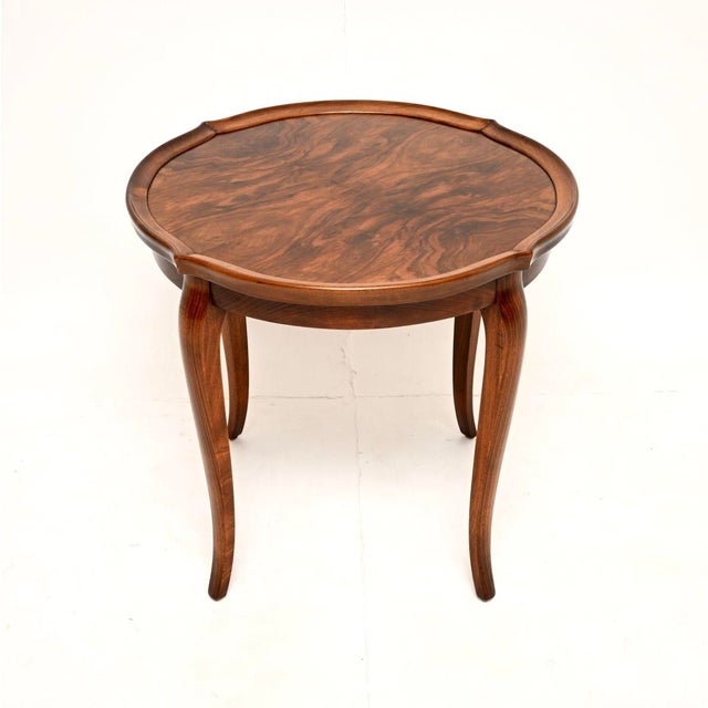 A beautiful and very well made antique figured walnut pie crust coffee / occasional table. This was made in England, it...