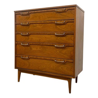 Vintage Mid Century Modern Four Drawer Dresser With Sculpted Drawer Fronts and Brass-Toned Pulls For Sale