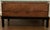 This large early 20th C traveling trunk is fashioned in leather and has brass corner protectors. It has been well used. We...