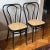 Offering a matched pair of early- to mid-20th century Italian bistro/cafe chairs. These lovely Thonet-style bentwood...