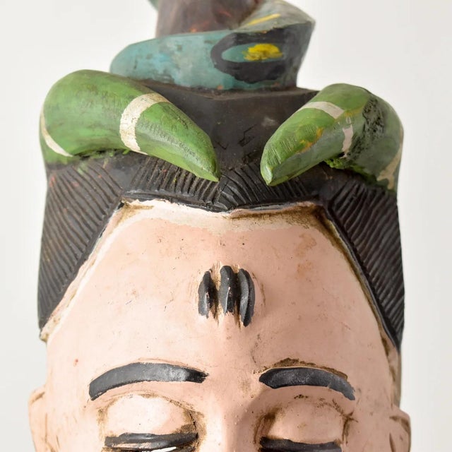 A Bobo Snake Mask from Burkina Faso is a captivating and significant cultural artifact of the Bobo people, an ethnic group...