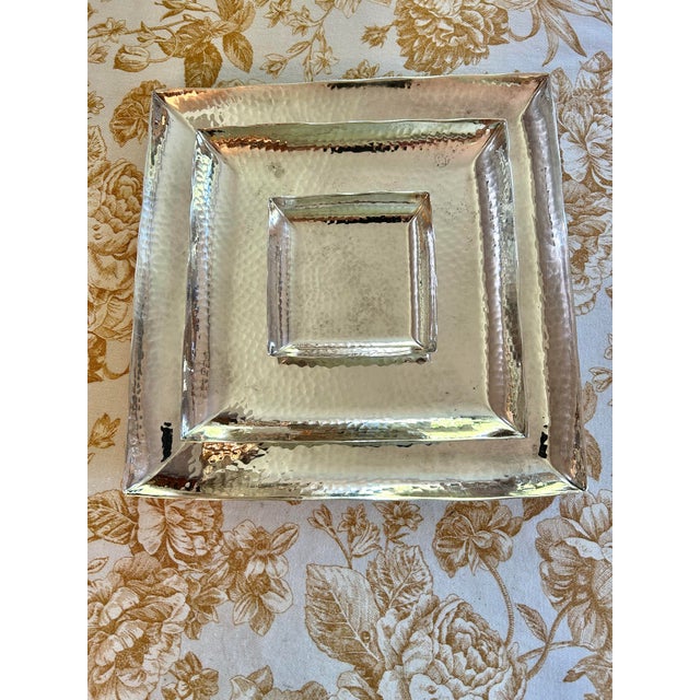 This set of 3 nesting trays are the perfect sizes for serving appetizers or for using on a barcart. When not in use they...