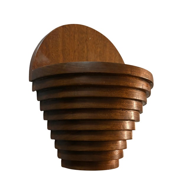 Art Deco wooden wall pocket planter. The design includes a back wall that rises 12” and a semicircular well of 8” in depth...