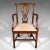 This is an antique drawing room elbow chair. An English, mahogany carver in Chippendale taste, dating to the Georgian...