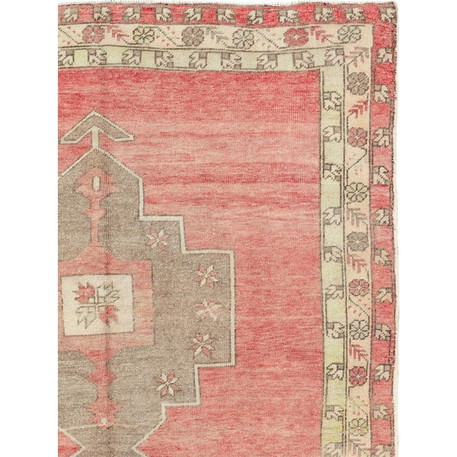 This mid-20th-century Turkish Anatolian wide gallery runner presents three large stepped medallions aligned along a warm...