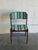 In style of Erik Buch Model 49 dining chair features a sculpted frame with organic curves and an elegant floating seat...