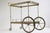 Gorgeous full brass neoclassical bar cart / serving trolley designed by Maison Bagues in 1940. An exquisite quality piece,...