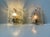 Fagerlund Ice wall lights manufactured by Orrefors in Sweden during the 1960s. The textured crystal glass shading creates...