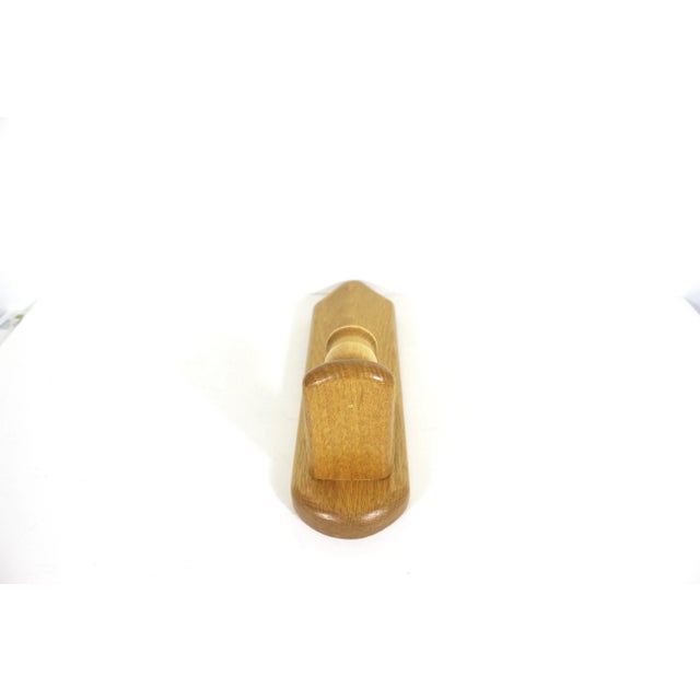 Width: 3.25 inches Height: 12 inches Depth: 4.25 inches This is a vintage honey coloured wood mid century modern candle...