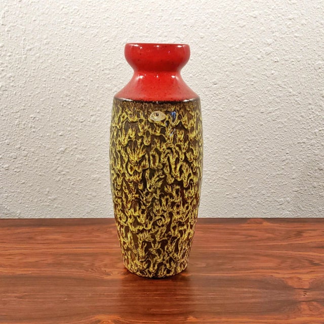 Ü KERAMIK VASE 1271/30 $88.00 CONTACT US HERE ABOUT THIS ITEM. A tall Ü KERAMIK flower vase from the 1970s.A canary yellow...