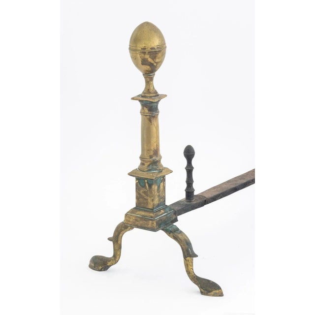 Pair of American Empire Brass Andirons, 19th century, with two front hoof feet. 19.5" H x 12.5" W x 22.5" D. Provenance:...