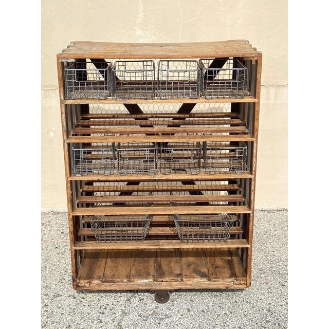 Antique Industrial Distressed Gray Painted Wooden Rolling Shelf Storage Cart Store Display. Item features solid wood...