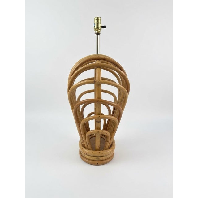 Vintage Bamboo Rattan Large Scale Lamp features a stylish and unique design perfect for coastal or tropical-themed rooms....