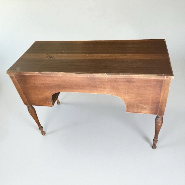 A beautiful example of Grand Rapids furniture craftsmanship, this Federal Revival vanity desk was produced by Berkey &...