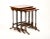 Enhance your living space with this set of 19th Century English Burl Mahogany Wood Stacking Tables, a charming and...