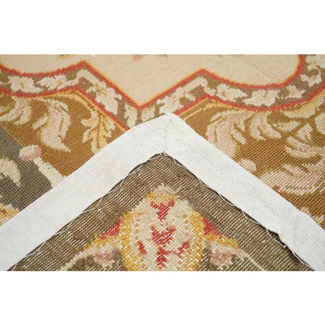 Looks Victorian /Second Empire, but it is actually recent. A 4 by 6 array of straw octogrammes with rose bouquet centres...