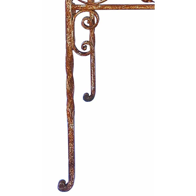 Mid century wrought iron scrollwork garden table. Distressed paint and surface rust. Just need to have glass cut for the...