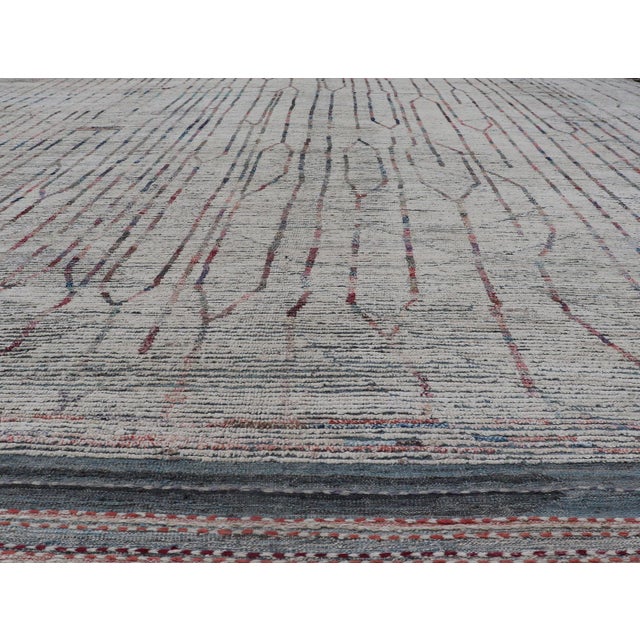 Neutral tone rug with Moroccan free-flowing tribal design with pops of color, Keivan Woven Arts / rug AFG-36116, country...